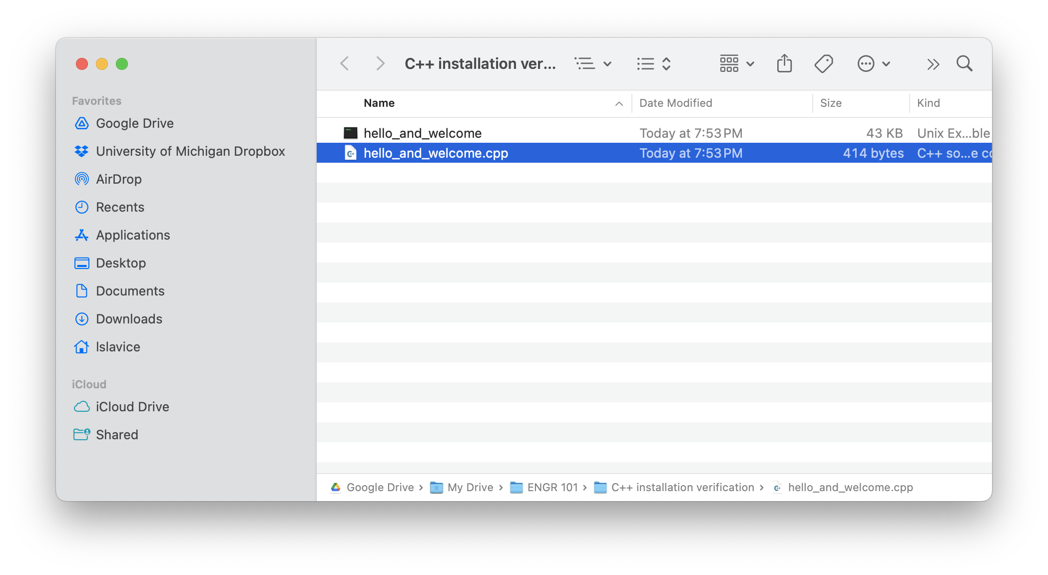 Screenshot of the Finder app showing that the hello_and_welcome.cpp file lives in a folder that is synced to Google Drive.